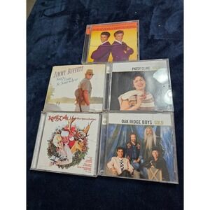 Lot of CDs Jimmy Buffett Patsy Cline Oak Ridge Boys Everly Brothers Kenny Dolly